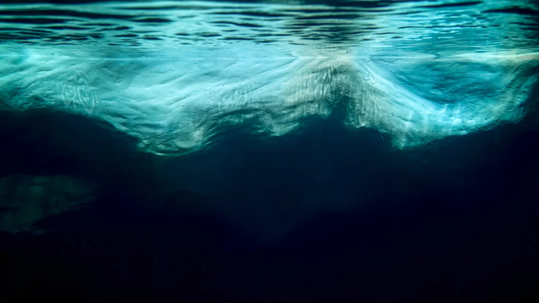 Iceberg, most of it beneath the surface
